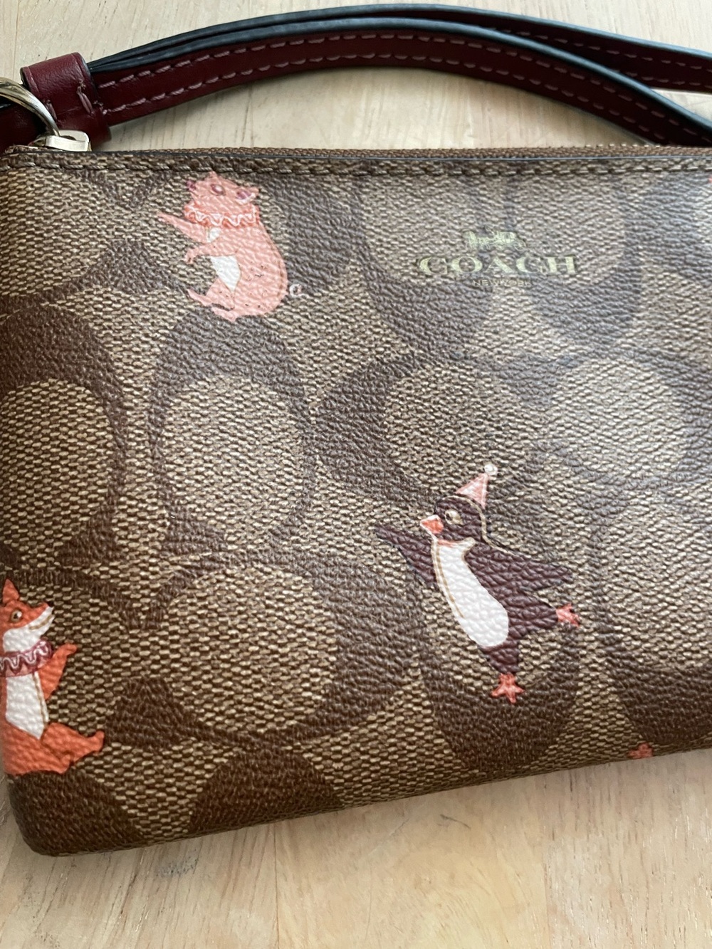 Party animal corner zip signature wristlet - Picture 2 of 6